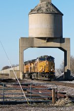 UP 7177 leads eastbound empties under the old coaling tower